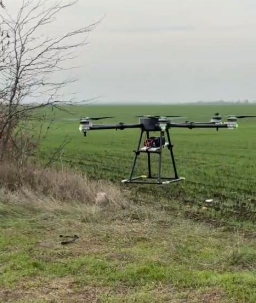 LA-H60 in flight over agricultural field